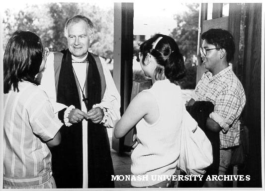 Bishop Peter Hollingworth talking with students Wendy Tap (left) and Renee Tan (second right) after service in the Religious Centre to mark beginning of the academic year