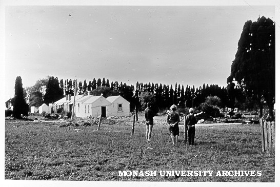 Stephen, Audrey and Roger Matheson looking at Talbot Colony buildings