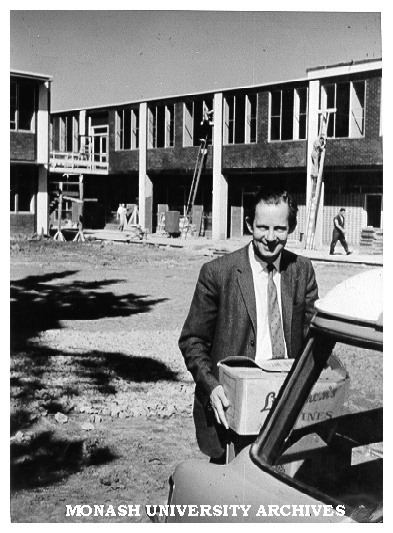 Professor W. A. G. Scott unloading car outside Science buildings
