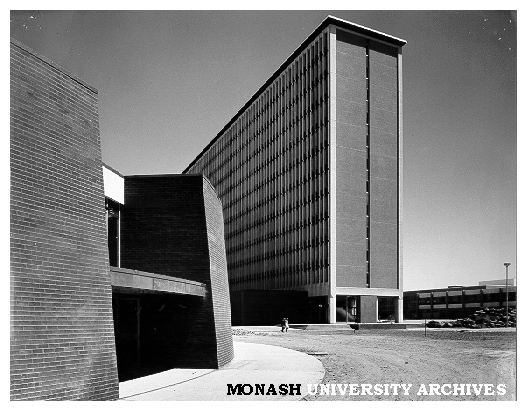 Humanities building flanked by Rotunda lecture theatres at left