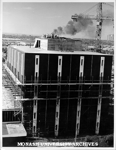 Fire in roof of Main Library during construction, March 1975