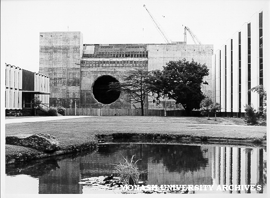 Great Hall under construction, view of west facade flanked by University Offices and Main Library