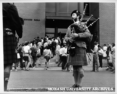 Graham McGregor (facing) and Keith Wilkins (left) piping students into Robert Blackwood Hall
