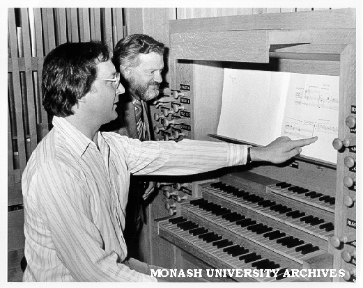 John O'Donnell (left) checking score of 'Orgelwerk' with Graduates Association president, David Harris