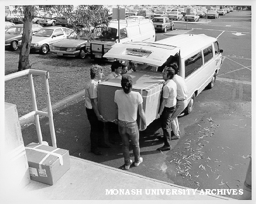 Hall staff taking delivery of audio-mixer