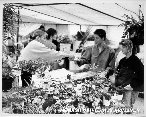 Customers at plant stall, Friday market