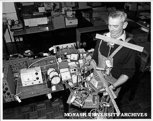 Tim McNair with goods to be sold in 'garage sale' of used equipment