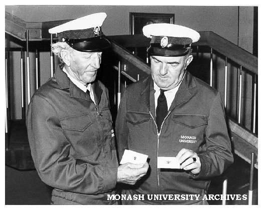 Drivers Jack Finch (left) and Kevin Perry with National Safety Council Freedom from Accident badges