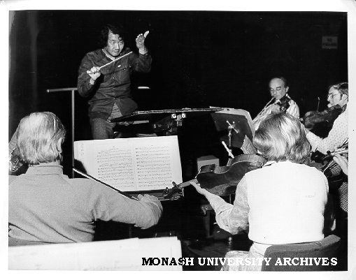 Japanese conductor Hiroyuki Iwaki with members of Melbourne Symphony Orchestra
