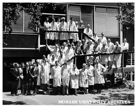Bates, Smart and McCutcheon staff outside their office