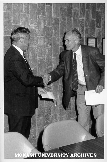 Dean Professor Robert Porter (left) presenting Dr Uwe Proske with Medicine Faculty Award