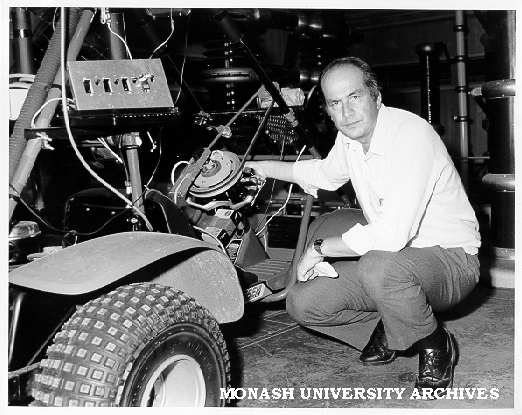 Professor Ray Jarvis with robot dune buggy