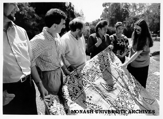 Development Studies Centre staff with ceremonial tapa mat from Tonga