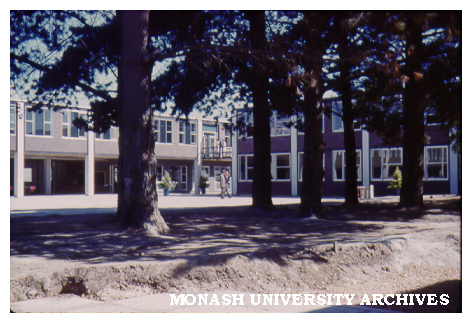 Science buildings with pine trees in foreground
