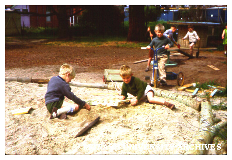 Children playing in sandpit, Birch Cottage