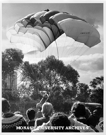 Students watching landing by Skydiving Club member