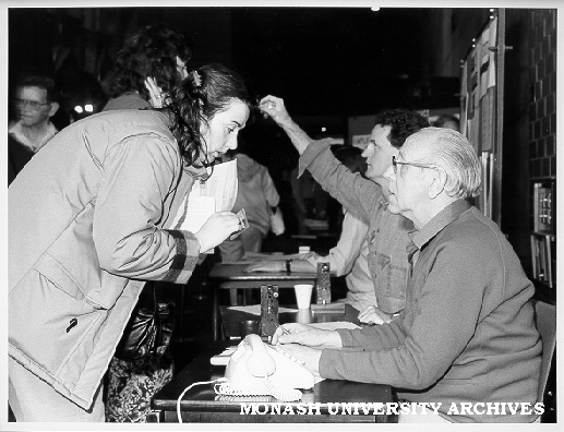 Records officer George Bloom re-enrolling students