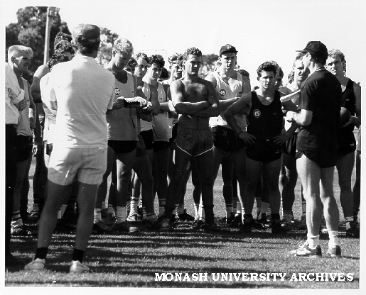 Richmond Football Club training at Monash with coach Kevin Bartlett (right) addressing team