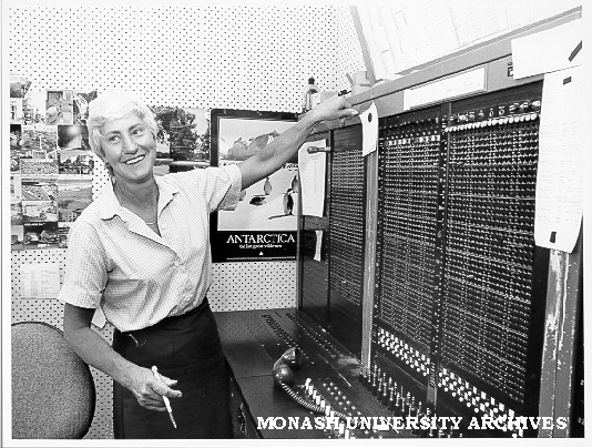 Supervisor Mrs Betty Gooch turning off switchboard