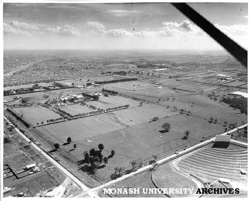 Aerial view of Clayton campus, September 1960, drive-in in right foreground