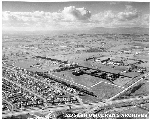 Aerial view of Clayton campus, September 1960, intersection of Wellington and Dandenong roads in foreground