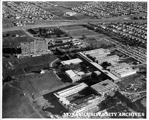 Aerial view of completed Science buildings, July 1962, with Engineering buildings under construction in foreground and Humanities building centre left