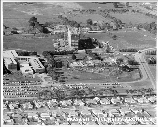 Aerial view of construction of Humanities and Medicine buildings, July 1962, from west with Beddoe Avenue in foreground
