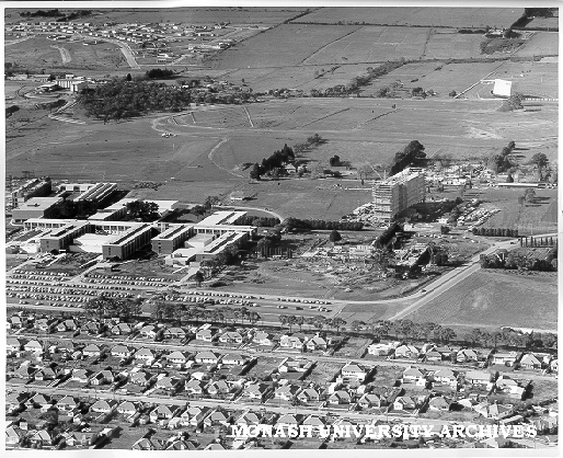 Aerial view of building construction, July 1962, from west with Beddoe and Marshall avenues in foreground and halls in back left hand corner