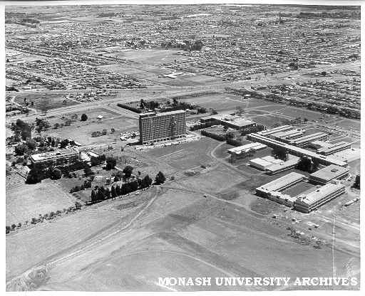 Aerial view of buildings, 21 January 1963, from north east, with Main library on left and Engineering on right