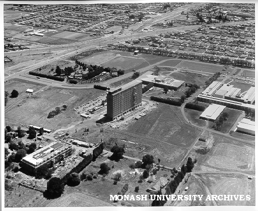 Aerial view of buildings, 21 January 1963, from north east, with Main library in left foreground