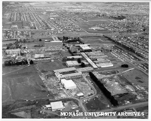 Aerial view of site and buildings, December 1963, from north, with north ring road in foreground