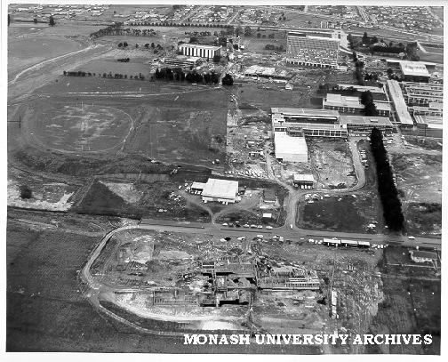 Aerial view of site and buildings, December 1963, from north with CSIRO site in foreground