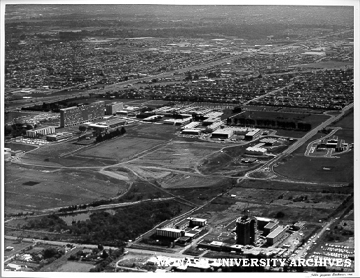 Aerial view of site and buildings, April 1966, from north west corner with halls of residence in foreground