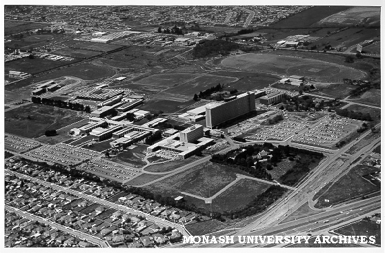 Aerial view of site, February 1966, from south west with intersection of Wellington and Dandenong roads in foreground