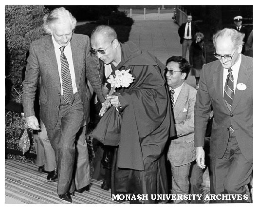 Dalai Lama, Deputy Vice-Chancellor Professor Kevin Westfold (left) and Dean of Medicine Professor Graeme Schofield (right)