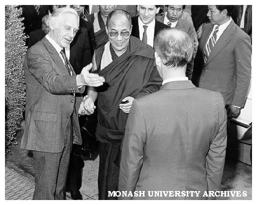 Dalai Lama being welcomed by Deputy Vice-Chancellor Professor Kevin Westfold (left)