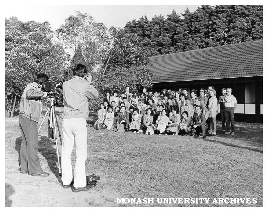 Visitors from Toyama Prefecture in Japan being photographed outside Japanese Studies Centre