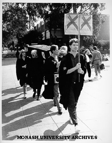 Mock funeral procession, advertising Choral Society's major concert - Verdi's 'Requiem' at Robert Blackwood Hall