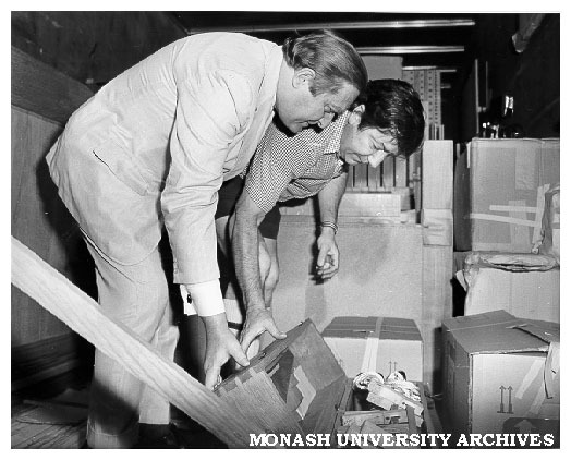Director of Robert Blackwood Hall Dr Ian Hiscock and Consul General of Germany Dr F. Kroneck inspecting crates in organ container