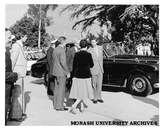 Prince Charles arriving at Monash being greeted by Vice-Chancellor Professor Ray Martin and Mrs Rena Martin
