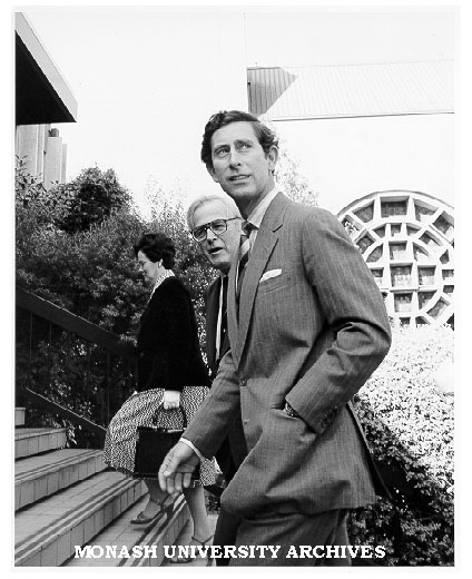 Prince Charles entering administration building accompanied by Chancellor Sir Richard Eggleston and Mrs Rena Martin