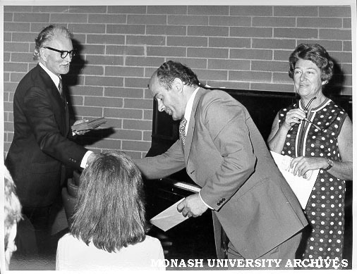 Award of certificates for English language intensive course. Mrs Hedy Hurst, senior tutor in German (right) , Assistant Commonwealth Director of Immigration for Victoria Mr D. S. Waddell (left)