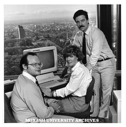 Chisholm computer experts Mr Noel Craske (left) and Mr Graeme Shanks are to develop an expert systems project with Ms Jenni Masters (centre) of Arthur Andersen Company