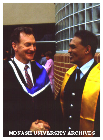 Federal police Sergeant Lawrence D'Ekenaike (right) with Assistant Commissioner for Southern Region Walter Williams after graduating Associate Diploma in Police Studies