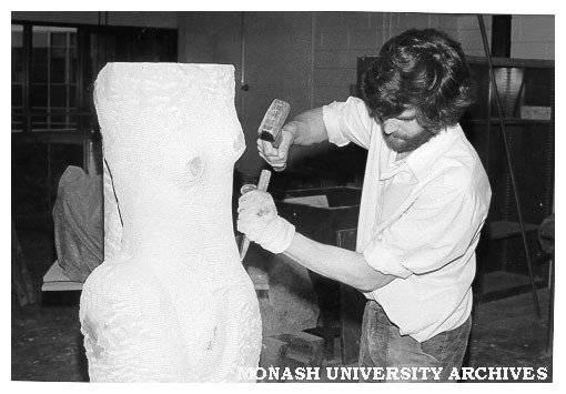 Sculptor Michael Cartwright carving torso from sandstone block donated by Ripponlea