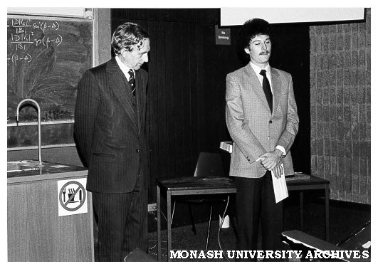 Engineering student Russell Page (right) receiving award from Eric Stokes of IEA