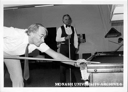 Billiards match between Director Ron Cumming and Eric Hemingway of School of Applied Science