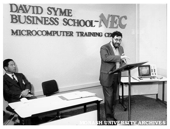 Opening of David Syme Business School-NEC microcomputer laboratory. Minister for Science and Technology Mr Barry Jones (right)and Managing Director of NEC Australia, Mr K. Kagiyama