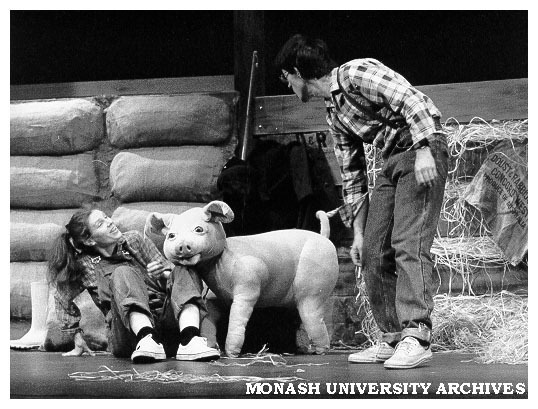 Elizabeth Paterson as Fern and Roland Manderson as Avery with Wilbur the pig, in 'Charlotte's Web'