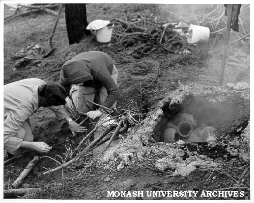 Students firing pots at camp on French Island